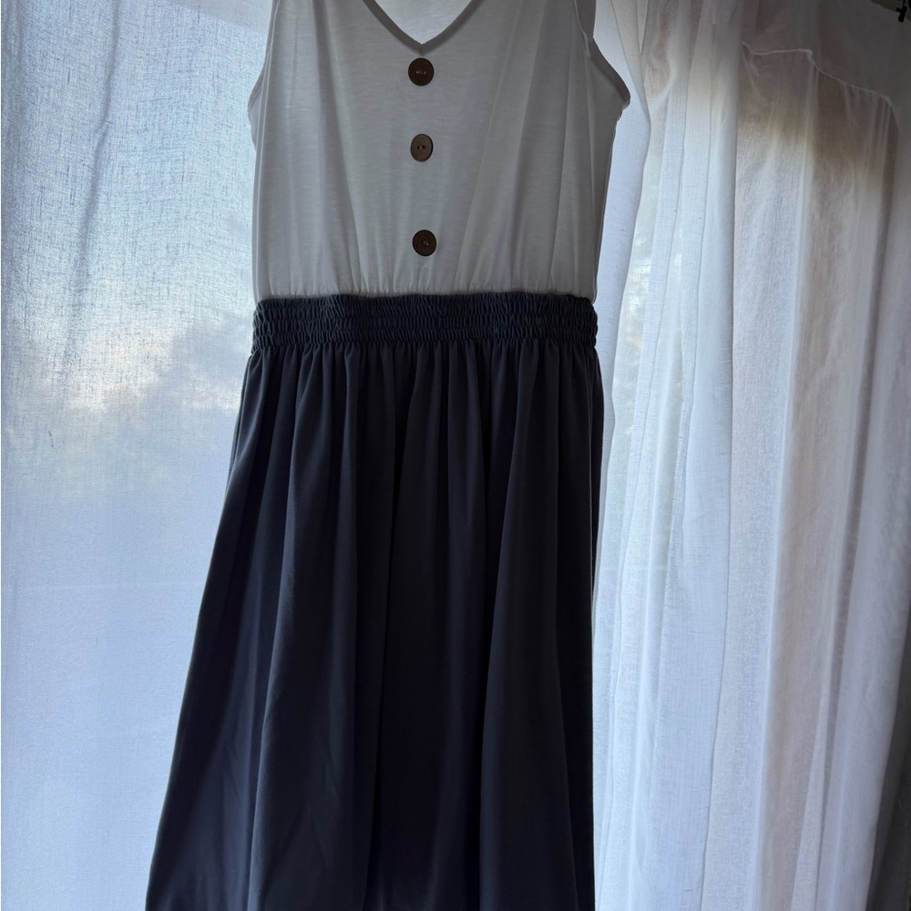 Sleeveless White and Black Button Dress